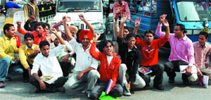 Students of a private institue raising slogans against the authorities at Mall Road, Bathinda, on Tuesday.