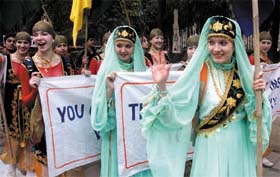 Students from Russia participate in a peace march as part of the ongoing international festival of children in the Capital