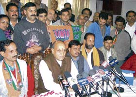 BJPs chief ministerial candidate Prem Kumar Dhumal addresses mediapersons at Una