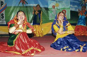 Students of Him Academy Public School present a dance performance during the annual day celebrations at Hamirpur
