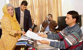 Chandresh Kumari, Congress candidate from Dharamsala, files her nomination papers at Dharamsala on Wednesday.