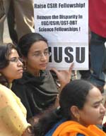JNU students along with research scholars of other central universities protest against the UGC's decision to stall fellowships, outside the UGC office in the Capital on Thursday