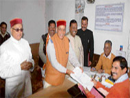 BJPs chief ministerial candidate Prem Kumar Dhumal files his nomination from the Bamsan constituency at Hamirpur