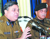 BSF IG Arvind Ranjan (L) interacts with mediapersons in Jalandhar on Friday.