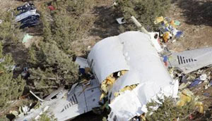 The wreckage of Atlas-Jet Airline MD-83 lies on the hills near cukuroren village in Isparta province, central Turkey, on Friday as rescue teams and officials work on the site. 