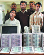 South District Delhi Police arrested three persons who were engaged in making currency notes, at DCP office in Sarita Vihar in the Capital 