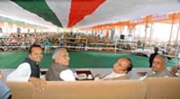Chief Minister Bhupinder Singh Hooda (second from left) at a party rally in Shahabad Markanda on Sunday. 