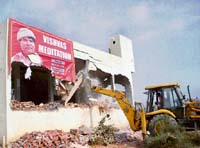 A demolition drive in progress in Kaithal on Sunday. 