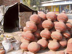 With the onset of the winter, there are no takers for these matkas lying outside a potters jhuggi in Hisar. 