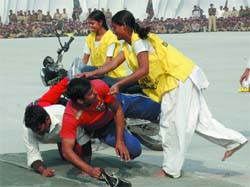 A demonstration of self-defence on the occasion of Raising Day parade of home guards and cIvil defence in the Capital on Thursday