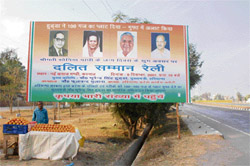 A hoarding placed by Congress supporters near the Pipli chowk in Kurukshetra on NH-1