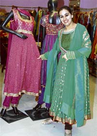 A visitor from Delhi tries an ‘Anarkali’ suit at one of the shops on Mall Road, Ludhiana
