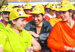 SAD (B) supporters wearing caps distributed by Pyare Lal Karnail Singh Memorial Charitable Trust on the occasion of CM Parkash Singh Badals birthday in Bathinda