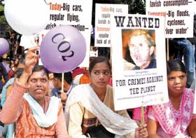 Children participate in an awareness rally against global warming at Jantar Mantar in the Capital