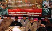 Mohammad Yasin Malik, chief of the Jammu and Kashmir Liberation Front (second from left), on a fast with party activists in Srinagar on Sunday.