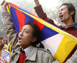 Tibetan activists raise slogans demanding peaceful solution to their problems through a dialogue between India and China, in the Capital