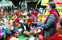 CPM MP Brinda Karat addresses a dharna of All India Democratic Women Association workers on the occasion of International Human Rights Day at Jantar Mantar in the Capital