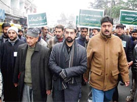 All Party Hurriyat Conference chairman Mirwaiz Umar Farooq and other senior Hurriyat leaders carry out a march to mark the World Human Rights Day in Srinagar on Monday.