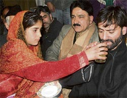Mohammed Yasin Malik, chief of the Jammu and Kashmir Liberation Front, breaking his two-day hunger strike against what they claim to be human rights violations by the security forces in Srinagar on Monday.