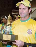Chandigarh Lions skipper Chris Cairns with Man of the Match trophy.