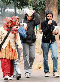These students of Panjab University, Chandigarh, seem to relish a walk in the rain on Tuesday.