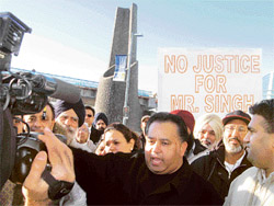 Protesters raise slogans against Laibar Singhs deportation, in Vancouver on Tuesday.