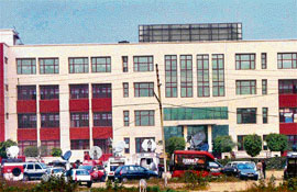 Media vehicles near Euro International School in Gurgaon on Wednesday where a boy was shot dead by classmates.