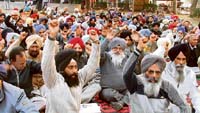 Member of the Democratic Teacher Front (DTF) hold a rally in front of the Deputy Commissioner’s office in Ludhiana on Wednesday.