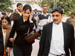 Shweta Mahajan on the way to the court for filing divorce papers in Gurgaon on Thursday. 