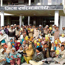 Villagers at the mini-secretariat in Jagadhri to lodge their protest against alleged discrepancies in the BPL list on Thursday. 