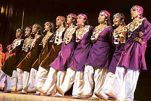 Students of Jammu and Kashmir Police Public School presenting a stage show during the annual function of the school in Jammu on Friday.