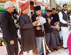 HPCC president Phool Chand Mullana (second from left) and irrigation and public works minister Ajay Singh Yadav (third from left) at the Vijay Diwas Samaroh in Rewari on Saturday.