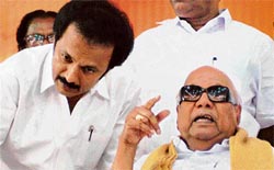 Tamil Nadu Chief Minister M Karunanidhi with his son and state local administration minister M.K. Stalin during the DMK youth wing conference at Tirunelveli on Saturday.