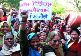 BJP supporters raise slogans against Chief Minister Sheila Dikshit during a demonstration in the Capital on Sunday.