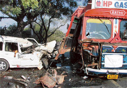 A damaged Scorpio and a truck which collided in Gurgaon on Tuesday. The driver of the Scorpio died in the accident.