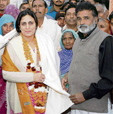 Members of the Dalit Samaj honour Sumita Singh, MLA, at her residence at Karnal on Tuesday. 