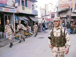The security forces conduct a flag march in Nahan ahead of the second phase of polling on Wednesday. 