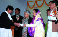 President Pratibha Patil distributes sweets to the mentally challenged children on her birthday in the Capital on Wednesday.