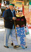 An elderly couple on its way to a polling booth in Shimla on Wednesday.