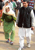 Sawari Devi (102) comes out after casting vote at a polling booth in Mandis Nachan segment.