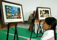 A girl having a look at the photographs put on display at the four-day exhibition that started at the Teachers Home in Bathinda on Thursday.