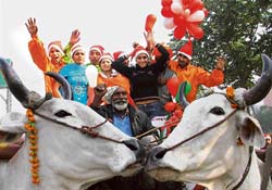 Revellers enjoy Chirstmas carnival organised by Park Plaza in Ludhiana on Thursday.