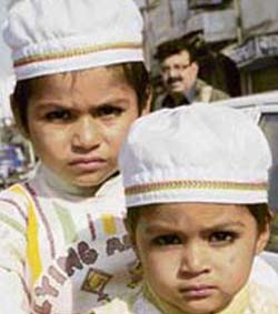 Two brothers on the way to a mosque on the occasion of Id in Karnal on Friday.