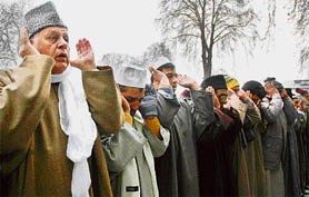 Former Jammu and Kashmir chief minister and National Conference patron Dr Farooq Abdullah with Kashmiri Muslims offering Id prayers at Hazratbal in Srinagar on Friday. 