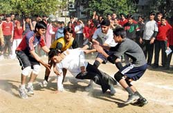 Players of New Senior Secondary School, Sarabha Nagar and Civil Lines branches, battle it out during a kabaddi match in Ludhiana on Saturday.
