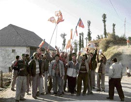 Residents of Jai Devi village, near Sundernagar, celebrate the BJP victory in Gujarat on Sunday.