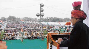 Chief Minister Bhupinder Singh Hooda addresses the nav vikas rally in Gurgaon on Sunday.
