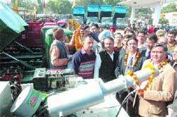 Local bodies minister Manoranjan Kalia inspects newly-purchased machines by Jalandhar municipal corporation on Sunday.