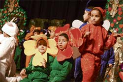choolchildren perform during the annual day function of KC International School in Jammu. 