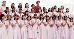 Students of UPSC Jain Public School perform a group song during annual day function in Ludhiana on Sunday.